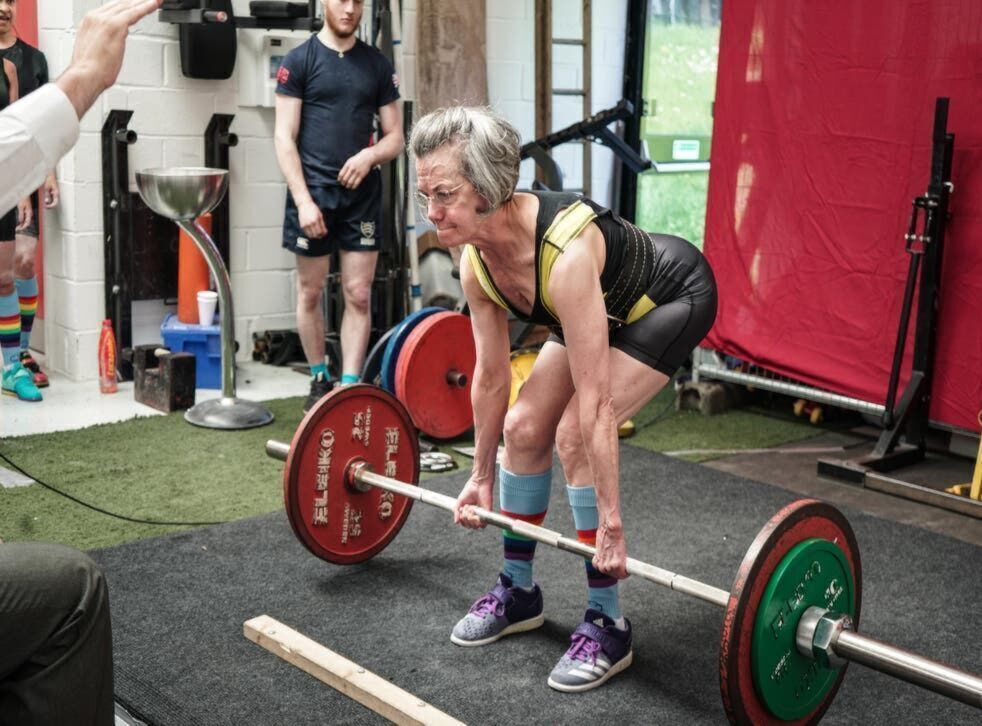 Old woman lifting dead lift